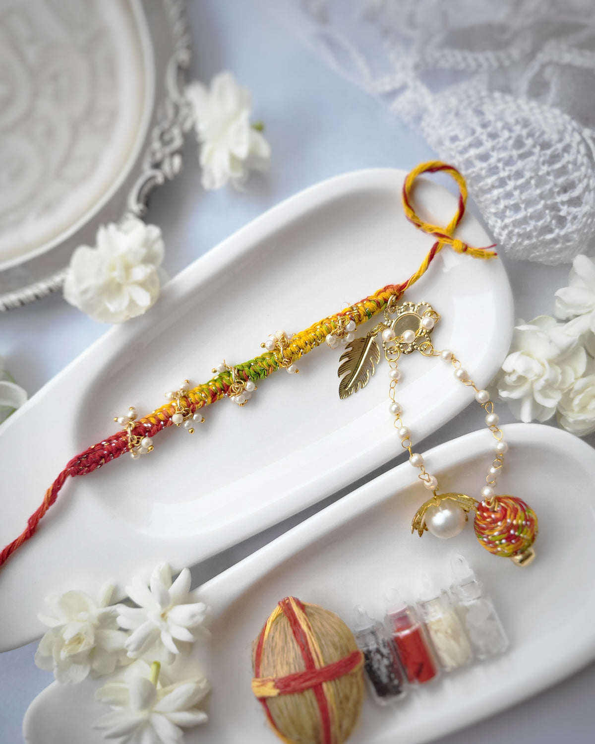 Pearl + Cowries in Mauli Dhaga Lumba Rakhi