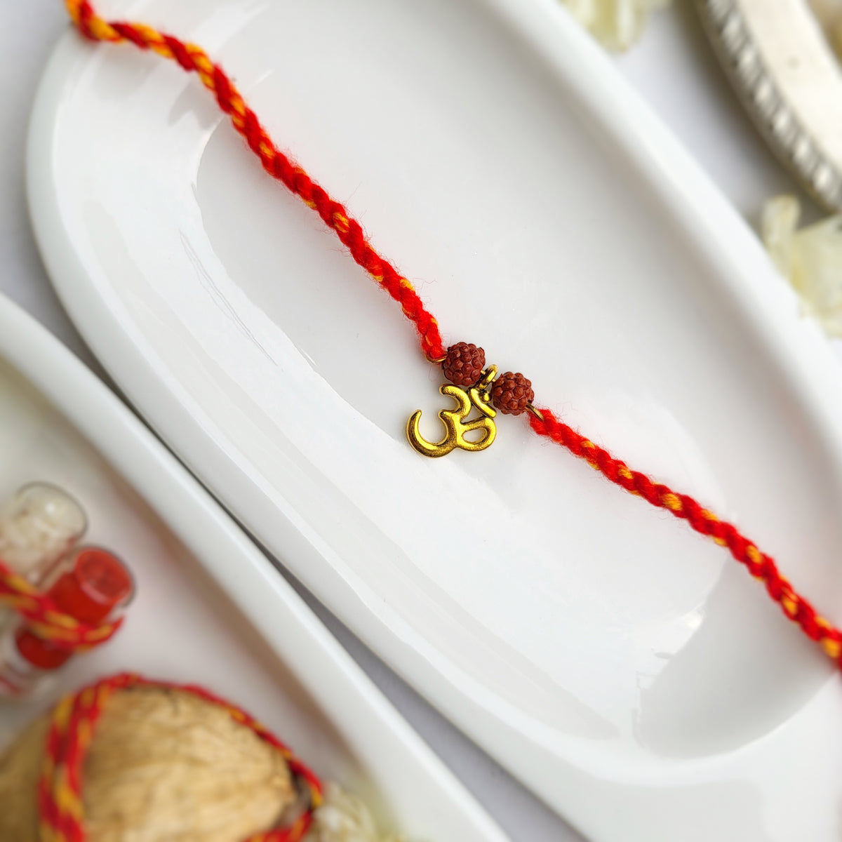 Om with 2 Rudraksh Rakhi